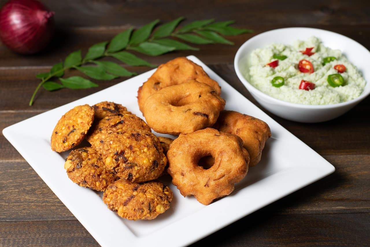 Crispy Vada in Spicy Rasam with Coconut Chutney
