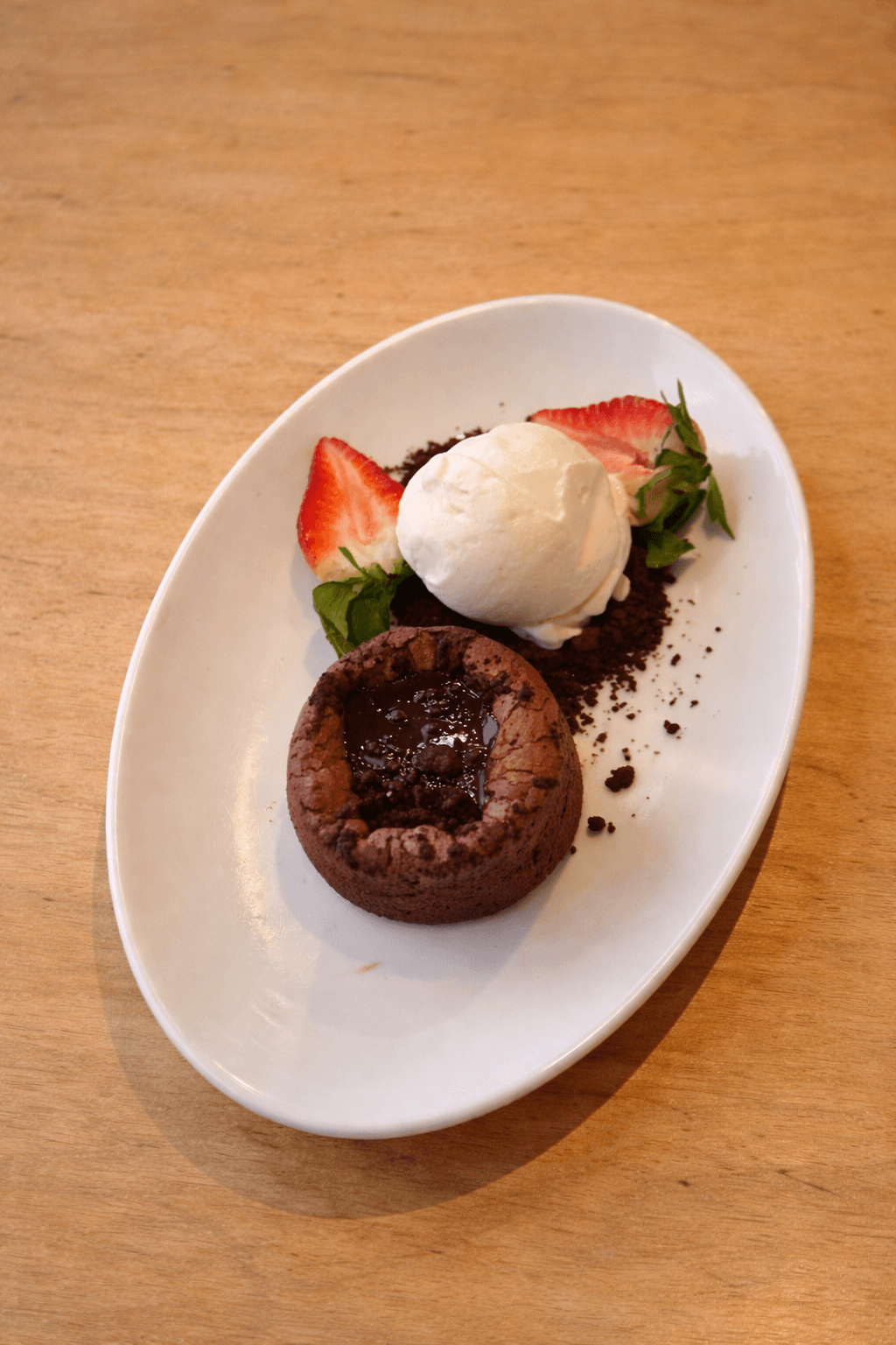 Molten Chocolate Brownie with Vanilla Ice Cream and Strawberries